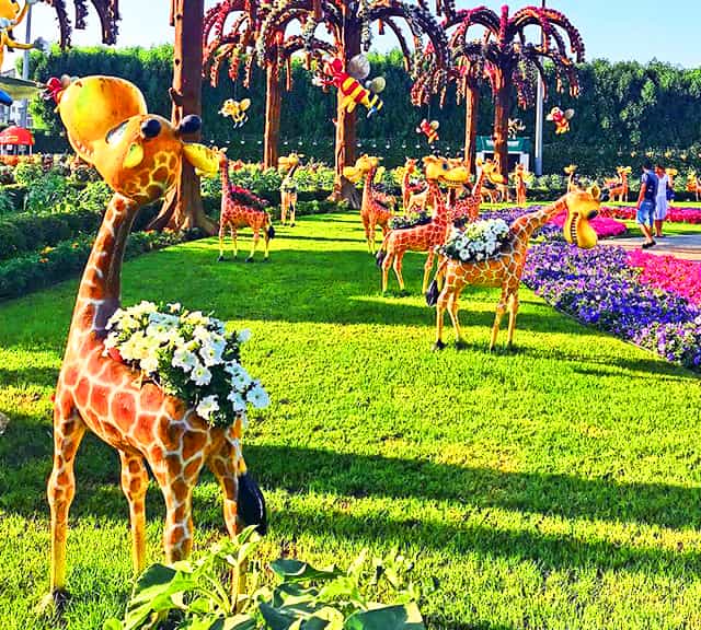 Giraffes floral theme is decorated with Petunia flowers on their backs