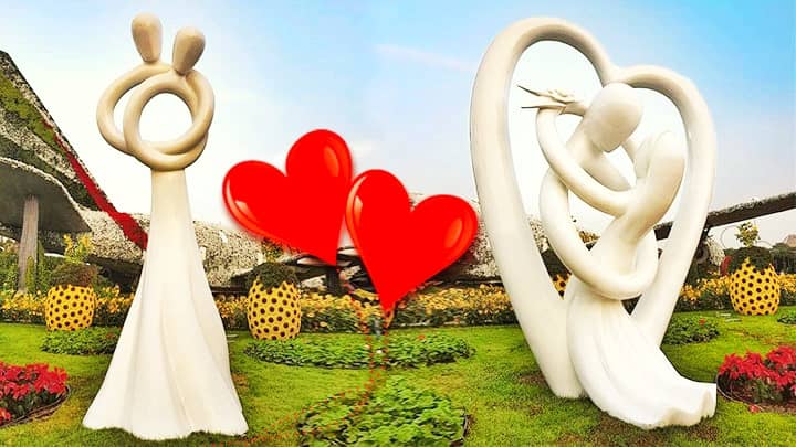 Romantic Sculptures of Hugging Rings at the Dubai Miracle Garden.