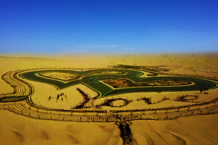 A heart-shaped love lake in Dubai. The lake is shaped like intertwined hearts.